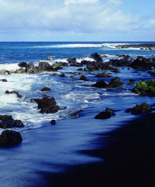 Hawaii Waves breaking on a black sand beach